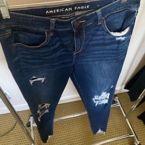 Dark wash never worn jeans with rips